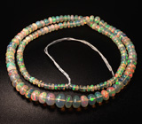 159 эфиопских опалов 35+ карат на нити 