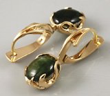 Комплект (серьги + кулон) с кабошонами зеленых сапфиров