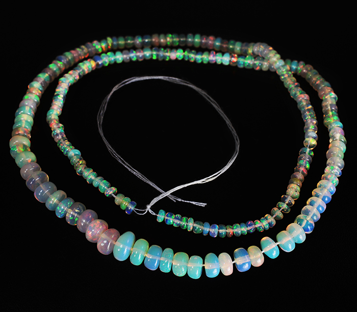 203 эфиопских опала 30+ карат на нити