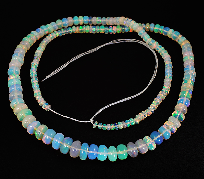 184 эфиопских опала 45+ карат на нити