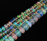 189 эфиопских опалов 35+ карат на нити 