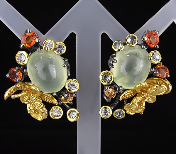 Серьги из серебра 925 пробы с пренитами и разноцветными сапфирами.