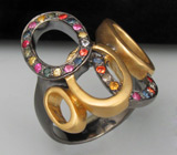 Кольцо из серебра 925 пробы с разноцветными сапфирами.