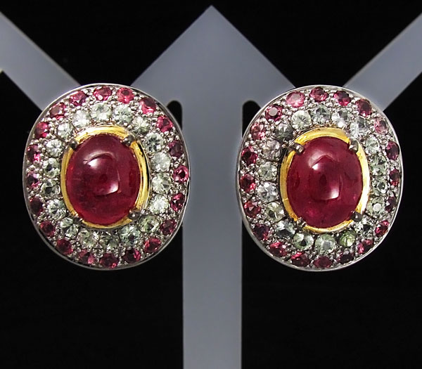 Серьги из серебра 925 пробы с разноцветными сапфирами.