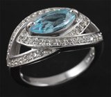 Эффектное серебряное кольцо с голубым топазом