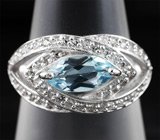 Эффектное серебряное кольцо с голубым топазом