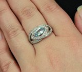 Эффектное серебряное кольцо с голубым топазом