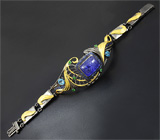 Серебряный браслет с кабошоном танзанита, синими сапфирами, голубыми топазами и цаворитами гранатами Серебро 925