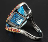 Серебряное кольцо с голубым топазом и красно-оранжевыми сапфирами Серебро 925