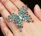 Превосходное серебряное кольцо "Бабочка" с голубыми топазами и родолитами Серебро 925
