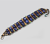 Серебряный браслет с разноцветными сапфирами, цаворитами и голубым топазом Серебро 925