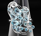 Чудесное серебряное кольцо с голубыми топазами