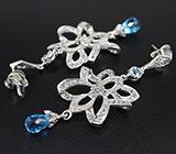 Эффектные серебряные серьги с бриолетами голубых топазов