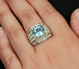 Эффектное серебряное кольцо с голубым топазом 6,06 карат