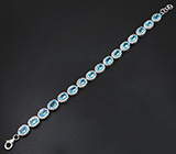 Элегантный серебряный браслет с голубыми топазами Серебро 925