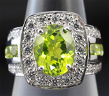 Стильное серебряное кольцо с перидотами Серебро 925