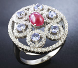 Изысканное серебряное кольцо с кабошоном пурпурного сапфира и танзанитами Серебро 925