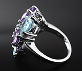 Роскошное серебряное кольцо с голубыми топазами, аметистами и иолитами Серебро 925