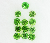 Набор из 12 уральских демантоидов 0,44 карат 