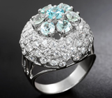 Эффектное серебряное кольцо с голубыми цирконами