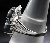 Эффектное серебряное кольцо со звездчатыми сапфирами Серебро 925