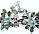 Серьги в форме бабочек с дымчатыми и голубыми топазами Серебро 925
