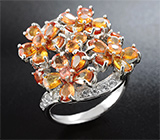 Замечательное серебряное кольцо с золотистыми сапфирами Серебро 925