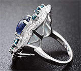 Замечательное серебряное кольцо с кианитом и синими топазами