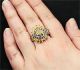 Эффектное серебряное кольцо с желтыми и синими сапфирами Серебро 925