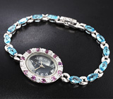 Часы с родолитами на серебряном браслете с голубыми топазами Серебро 925