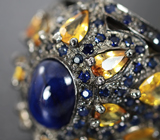 Серебряное кольцо с синими и желтыми сапфирами Серебро 925