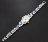 Часы с цаворитами на серебряном браслете с голубыми топазами Серебро 925