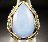 Серебряное кольцо с лавандовым халцедоном, голубыми топазами и синими сапфирами Серебро 925