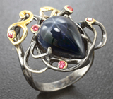 Серебряное кольцо со звездчатым сапфиром и рубинами Серебро 925