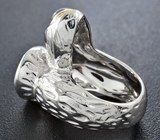 Серебряное кольцо с лабрадоритом и голубыми топазами