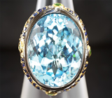 Серебряное кольцо c голубым топазом, синими сапфирами и цаворитами Серебро 925