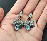 Изысканные черненые серебряные серьги с голубыми топазами Серебро 925
