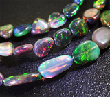 Топовое качество! Колье из 76 кристаллических черных опалов 28,5 карат на струне 