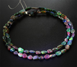 Топовое качество! Колье из 76 кристаллических черных опалов 28,5 карат на струне 