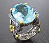 Серебряное кольцо с голубым топазом, синими сапфирами и цаворитами Серебро 925