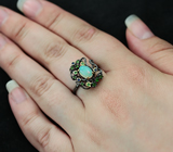 Серебряное кольцо с эфиопским опалом, синими сапфирами и цаворитами Серебро 925