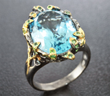 Серебряное кольцо с голубым топазом, синими сапфирами и цаворитами Серебро 925