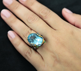 Серебряное кольцо c голубым топазом, цаворитами и синими сапфирами Серебро 925