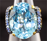 Серебряное кольцо с голубым топазом, синими сапфирами и цаворитами Серебро 925