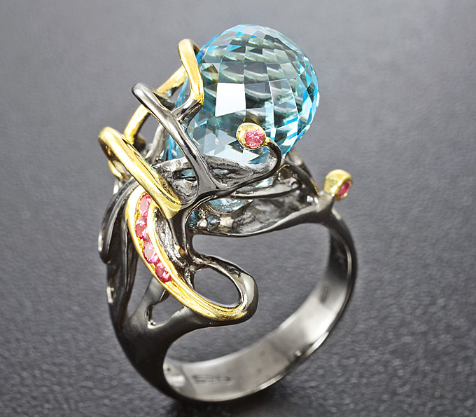 Серебряное кольцо с бриолетом топаза и сапфирами падпараджа