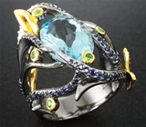 Серебряное кольцо с голубым топазом, цаворитами и синими сапфирами Серебро 925