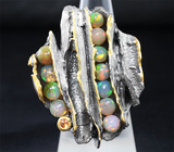 Серебряное кольцо с эфиопскими опалами и оранжевым сапфиром Серебро 925