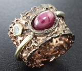 Серебряное кольцо со звездчатым рубином и голубым топазом Серебро 925