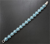 Серебряный браслет с голубыми и бесцветными топазами Серебро 925