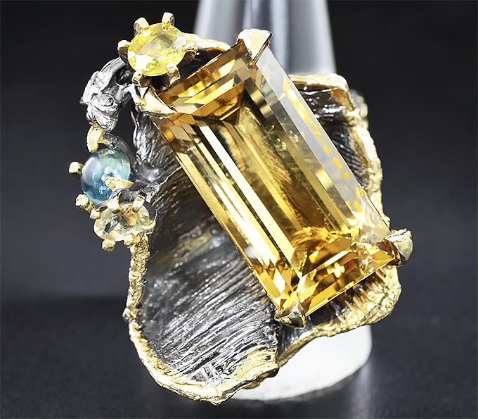 Серебряное кольцо с цитрином, топазом, сфеном и желтым сапфиром